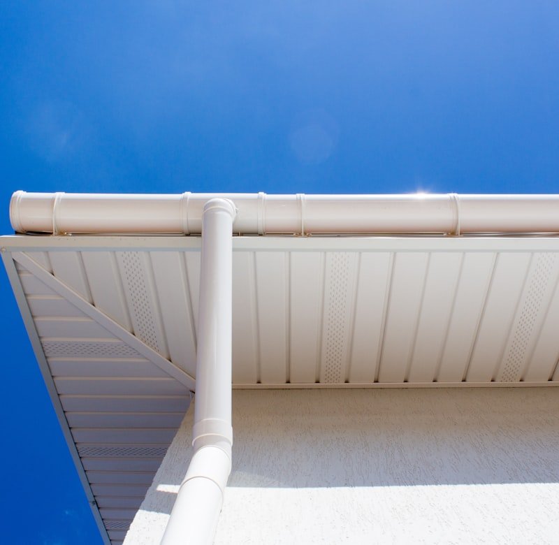White soffit, fascia and eavestrough on a roof edge